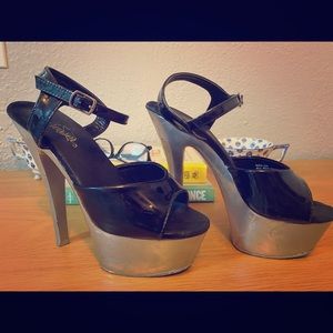 Pleaser Kiss 6in heals. Size 7.